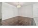 Formal dining area featuring hardwood floors and decorative chandelier at 3015 Azalea Blossom Dr, Plant City, FL 33567