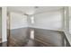 Expansive living area featuring gleaming hardwood floors and abundant natural light at 3015 Azalea Blossom Dr, Plant City, FL 33567