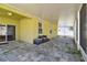 Enjoy the covered lanai with stone floors, perfect for relaxing outdoors at 3015 Azalea Blossom Dr, Plant City, FL 33567