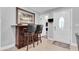 Stylish bar area featuring a rich wooden bar, comfortable seating, and elegant decor at 315 Oakwood Blvd, Oldsmar, FL 34677