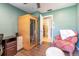 Office area includes sauna, hardwood floors, and a doorway leading to bathroom at 315 Oakwood Blvd, Oldsmar, FL 34677
