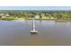 Aerial view of a pier at the end of a park in Oldsmar, Florida on Tampa Bay in the Gulf of Mexico at 315 Oakwood Blvd, Oldsmar, FL 34677