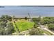An aerial view of a pier, park and green space on a waterfront on Tampa Bay in Oldsmar, Florida, on a sunny day at 315 Oakwood Blvd, Oldsmar, FL 34677