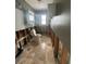 Bathroom featuring tile floors, cabinets, and a toilet; needs renovation at 4031 Bay Ne St, St Petersburg, FL 33703