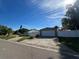 Charming single story home with a detached garage and long driveway for ample parking at 4031 Bay Ne St, St Petersburg, FL 33703