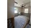 Empty room featuring exposed framework along the walls and dual windows for natural light at 4031 Bay Ne St, St Petersburg, FL 33703