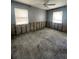 A gray room with exposed brick walls at the bottom and two windows at 4031 Bay Ne St, St Petersburg, FL 33703