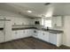 Modern kitchen with granite countertops and stainless steel appliances at 4102 Fox Ridge Blvd, Wesley Chapel, FL 33543