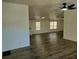 Open-concept living area showcases updated flooring and a bright, airy atmosphere at 4102 Fox Ridge Blvd, Wesley Chapel, FL 33543