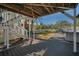 Charming backyard featuring a wooden deck, staircase, and a playset, perfect for outdoor activities and Gathering fun at 5153 Bay Blvd, Port Richey, FL 34668