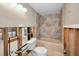 Bathroom includes a vintage tub, toilet, sink and partially open walls at 5153 Bay Blvd, Port Richey, FL 34668