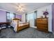 Cozy bedroom with traditional decor, comfortable bed, and ample natural light creates a relaxing and inviting retreat at 5153 Bay Blvd, Port Richey, FL 34668