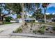 Charming home with well-maintained landscaping and a welcoming entrance at 5153 Bay Blvd, Port Richey, FL 34668