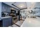 Modern kitchen features stainless steel appliances, sleek countertops, and stylish backsplash for a sophisticated culinary space at 5153 Bay Blvd, Port Richey, FL 34668