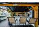 Outdoor bar with seating that's great for entertaining with plenty of space at 5153 Bay Blvd, Port Richey, FL 34668