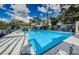 Sparkling swimming pool surrounded by a spacious deck for relaxing and enjoying the outdoors at 5153 Bay Blvd, Port Richey, FL 34668