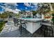 Unique poolside bar offers a perfect spot for entertaining, featuring a bar and seating area at 5153 Bay Blvd, Port Richey, FL 34668