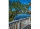Scenic water view from the home's deck with beautiful mature tree overhang at 5153 Bay Blvd, Port Richey, FL 34668