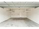 Spacious two car garage with shelving for storage at 569 52Nd N Ave, St Petersburg, FL 33703