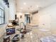 Close-up shot of kitchen showing granite countertops and stainless steel sink at 5714 Colony Glen Rd, Lithia, FL 33547
