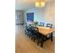 Inviting dining room featuring a large table, stylish seating, and ample natural light at 5955 30Th S Ave # 108, Gulfport, FL 33707
