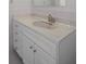 Bathroom vanity features white marble countertop, white cabinetry, and a modern faucet at 5980 Shore S Blvd # 312, Gulfport, FL 33707