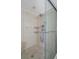 Modern bathroom shower with a glass door and neutral tile at 5980 Shore S Blvd # 312, Gulfport, FL 33707