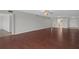 Large living room featuring hardwood floors, neutral walls, and an open floor plan at 5980 Shore S Blvd # 312, Gulfport, FL 33707