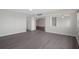 Inviting living room featuring luxury vinyl floors, neutral walls, and an open floor plan at 5980 Shore S Blvd # 312, Gulfport, FL 33707