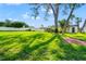 Spacious backyard featuring mature trees and plenty of room to play at 6070 Denver Ne St, St Petersburg, FL 33703