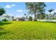 A large and manicured backyard with mature trees offers plenty of space at 6070 Denver Ne St, St Petersburg, FL 33703