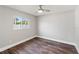 Bedroom featuring hardwood floors and a window with lovely natural light at 6070 Denver Ne St, St Petersburg, FL 33703