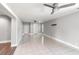 Open living room featuring tile flooring, neutral walls, and an abundance of natural light at 6070 Denver Ne St, St Petersburg, FL 33703