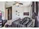 Modern bedroom with black accents, soft textures, and plenty of natural light at 6412 Mayra Shores Ln, Apollo Beach, FL 33572