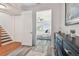 A peak into the the main bedroom with ocean view from the entry way at 6412 Mayra Shores Ln, Apollo Beach, FL 33572