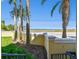 Lush tropical landscaping in front of the property, offers stunning views and privacy at 6412 Mayra Shores Ln, Apollo Beach, FL 33572