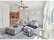 Inviting living room filled with natural light, stylish decor, and comfortable seating, perfect for relaxing at 6412 Mayra Shores Ln, Apollo Beach, FL 33572