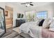 Serene main bedroom with ocean views, an ensuite bathroom, and contemporary decor for a peaceful retreat at 6412 Mayra Shores Ln, Apollo Beach, FL 33572
