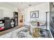 Well-lit office with trendy desk, stylish rug, and convenient access to bathroom and hallway at 6412 Mayra Shores Ln, Apollo Beach, FL 33572