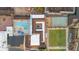 Aerial view of community amenities, including the pool, bocce ball court, and shuffleboard court at 646 Allegheny Dr, Sun City Center, FL 33573