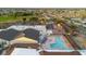 An aerial view showcases community amenities including a pool and recreational areas at 646 Allegheny Dr, Sun City Center, FL 33573
