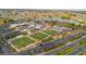 Aerial view showcases community amenities like a pool and green spaces at 646 Allegheny Dr, Sun City Center, FL 33573