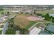 Aerial view of ball field and surrounding neighborhood at 646 Allegheny Dr, Sun City Center, FL 33573