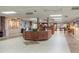 Inviting lobby area with ticket counter, comfortable seating, and information displays for residents and guests at 646 Allegheny Dr, Sun City Center, FL 33573