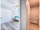 Hallway view into bedroom, with closet and laundry hookups at 6811 S Himes Ave, Tampa, FL 33611