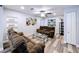Relaxing living room with ceiling fan, recessed lighting, and built-in shelving at 6811 S Himes Ave, Tampa, FL 33611