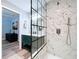Beautiful main bathroom featuring a glass shower and dual sink vanity at 6811 S Himes Ave, Tampa, FL 33611