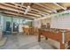 Finished basement with recreational area, laundry, and ample space for entertainment at 7000 14Th N St, St Petersburg, FL 33702