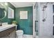 Modern bathroom featuring a tiled shower, updated vanity, and sleek fixtures at 7000 14Th N St, St Petersburg, FL 33702
