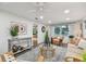 Inviting living room with comfortable seating, stylish decor, and plenty of natural light at 7000 14Th N St, St Petersburg, FL 33702
